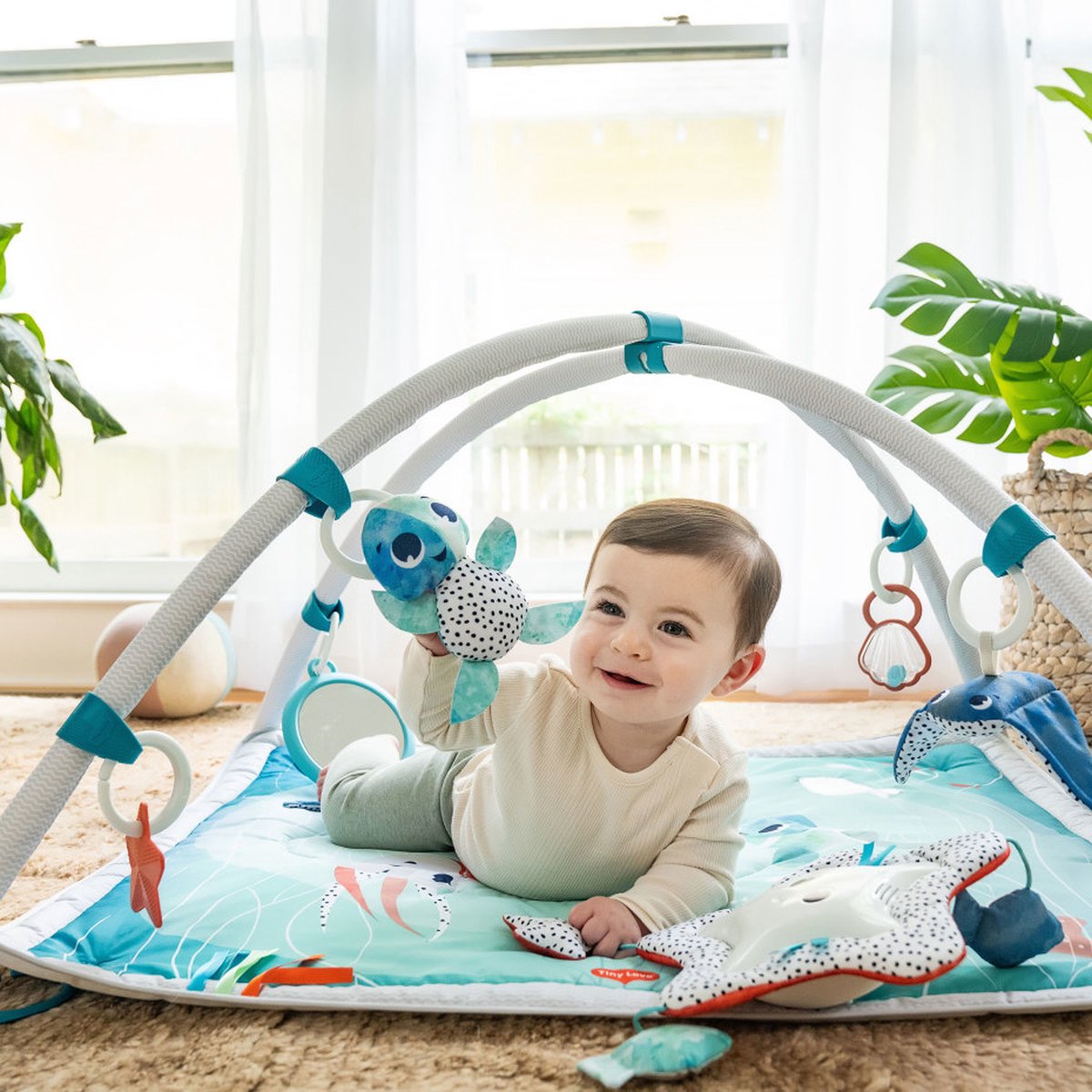 https://www.vanastenbabysuperstore.nl/media/catalog/product/0/3/0312490001_2_Babygym_Tiny_Love_Gymini_Treasure_The_Ocean.jpg