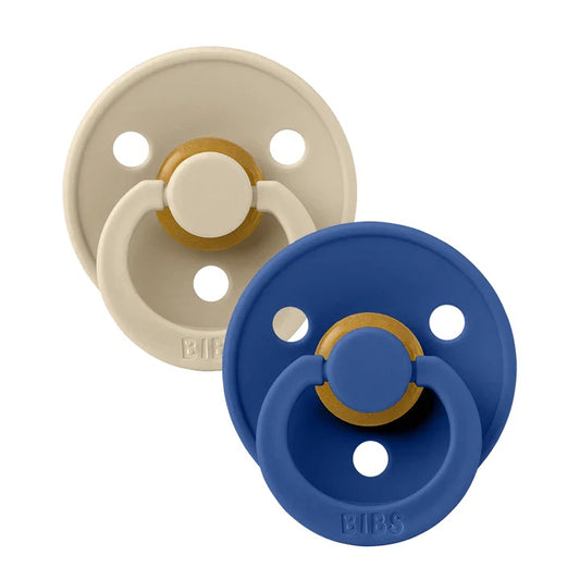 https://www.vanastenbabysuperstore.nl/media/catalog/product/1/9/1912820019_1_Fopspeen_Bibs_Colour_Vanilla_Cornflower_0_6mnd_2st.jpeg