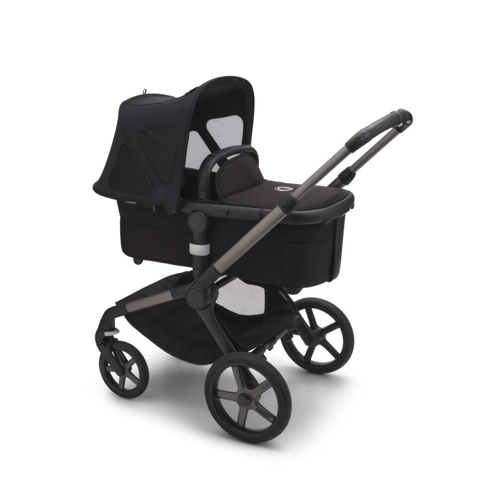 https://www.vanastenbabysuperstore.nl/media/catalog/product/7/5/7571120185_2_zonnekap_bugaboo_breezy_fox5fox_cub_v2_midnight_black.jpg