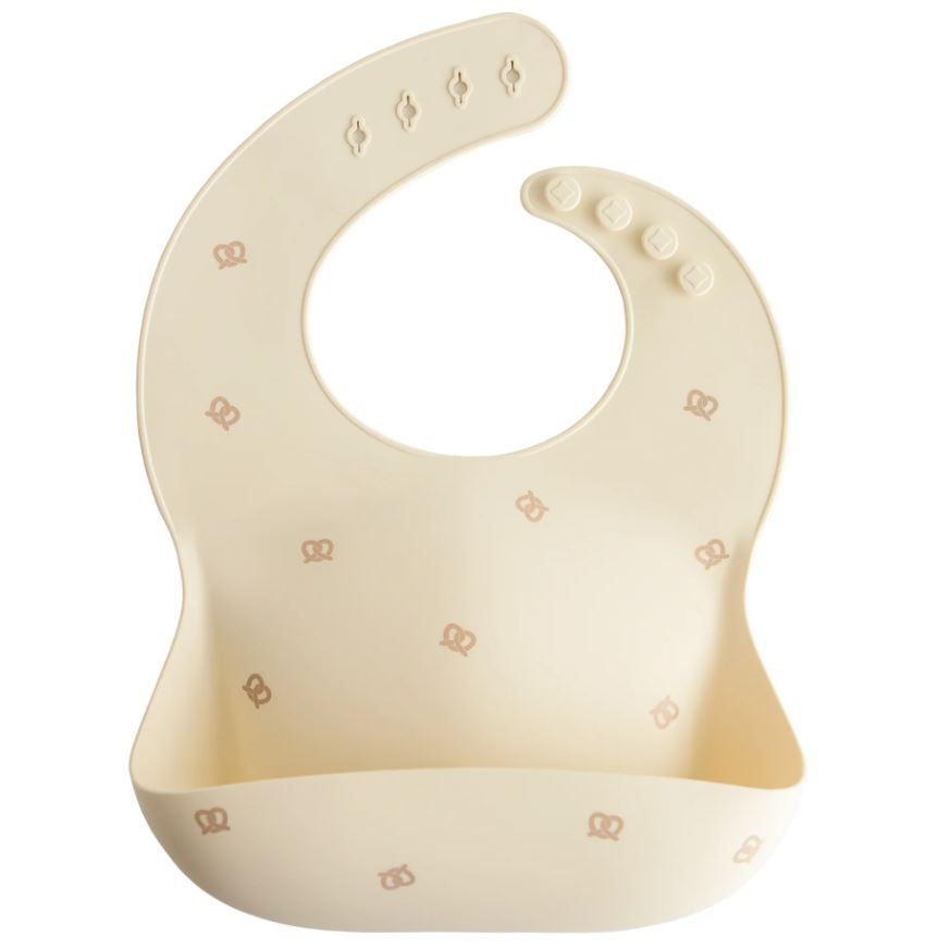 https://www.vanastenbabysuperstore.nl/media/catalog/product/8/2/8292110069_1_slabber_mushie_siliconen_pretzel.jpg