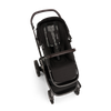 https://www.vanastenbabysuperstore.nl/media/catalog/product/0/1/0171100146_2_wandelwagen_nuna_demi_next_caviar.png