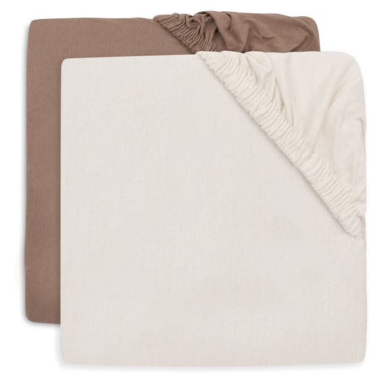 https://www.vanastenbabysuperstore.nl/media/catalog/product/0/6/0611800305_1_hoeslaken_junior_jollein_70x140_jersey_milky_coffee_ivory.jpg