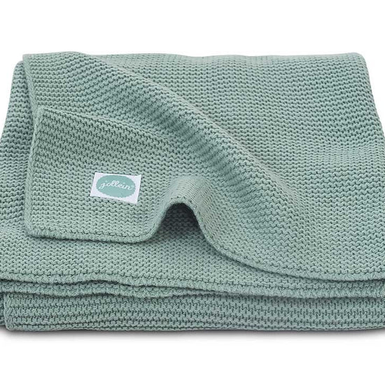 https://www.vanastenbabysuperstore.nl/media/catalog/product/0/6/0611900995_1_deken_jollein_ledikant_100x150_basic_knit_forest_green.jpg