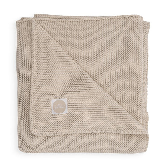 https://www.vanastenbabysuperstore.nl/media/catalog/product/0/6/0611901136_1_deken_wieg_jollein_75x100_basic_knit_nougat.jpg