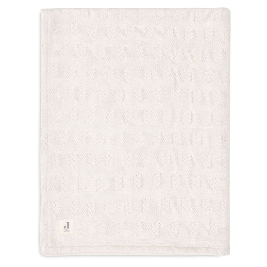 https://www.vanastenbabysuperstore.nl/media/catalog/product/0/6/0611901398_1_deken_ledikant_jollein_100x150_grain_knit_oatmealvelvet.jpg