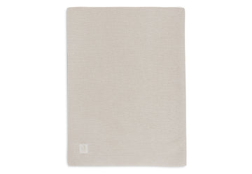 https://www.vanastenbabysuperstore.nl/media/catalog/product/0/6/0611901513_1_deken_wieg_jollein_75x100_basic_knit_oatmeal.jpg