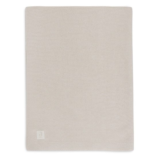 https://www.vanastenbabysuperstore.nl/media/catalog/product/0/6/0611901513_1_deken_wieg_jollein_75x100_basic_knit_oatmeal.jpg