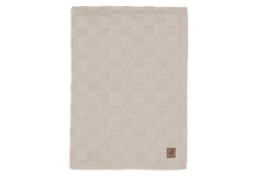 https://www.vanastenbabysuperstore.nl/media/catalog/product/0/6/0611901520_1_Deken_Ledikant_Jollein_100x150_Box_Knit_Warm_Sand.jpeg