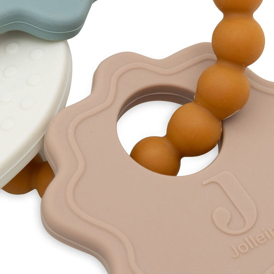 https://www.vanastenbabysuperstore.nl/media/catalog/product/0/6/0612400189_2_bijtring_jollein_siliconen_sleutelbos_lovely_birds.jpg