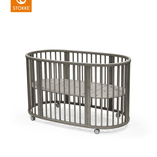 https://www.vanastenbabysuperstore.nl/media/catalog/product/0/8/0830010021_1_bed_stokker_sleepi_tm_bed_v3_hazy_grey.jpg