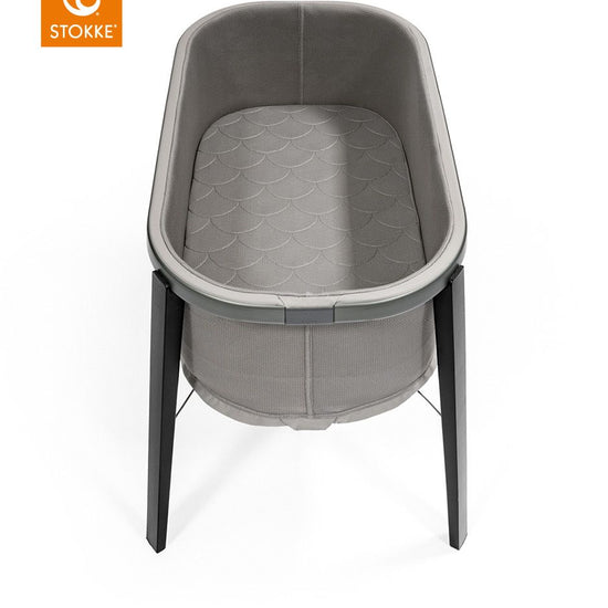 https://www.vanastenbabysuperstore.nl/media/catalog/product/0/8/0830060042_2_wieg_stokker_snoozi_tm_graphite_grey.jpg