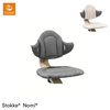 https://www.vanastenbabysuperstore.nl/media/catalog/product/0/8/0831610272_1_stoelverkleiner_stokke_nomi_grey_sand.png