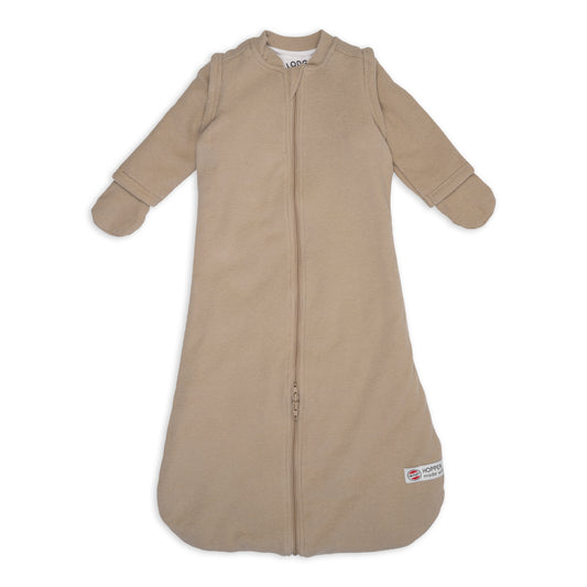 https://www.vanastenbabysuperstore.nl/media/catalog/product/1/2/1262150313_1_slaapzak_lodger_hopper_sleeves_nomad_rib_beige_68_80.jpg