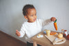 https://www.vanastenbabysuperstore.nl/media/catalog/product/1/3/1302400649_2_houten_snijplank_met_eten_tryco.jpg