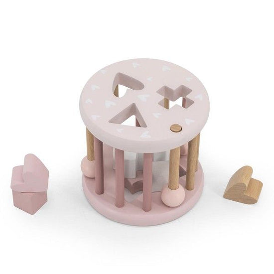 https://www.vanastenbabysuperstore.nl/media/catalog/product/1/3/1302400830_1_rollende_vormenstoof_labellabel_hout_pink.jpg
