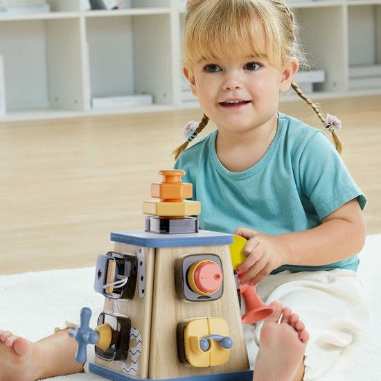 https://www.vanastenbabysuperstore.nl/media/catalog/product/1/3/1302430007_3_topbright_busy_tower.jpg