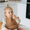 https://www.vanastenbabysuperstore.nl/media/catalog/product/1/3/1372870003_slabber_funnies_siliconen_copper_2.png