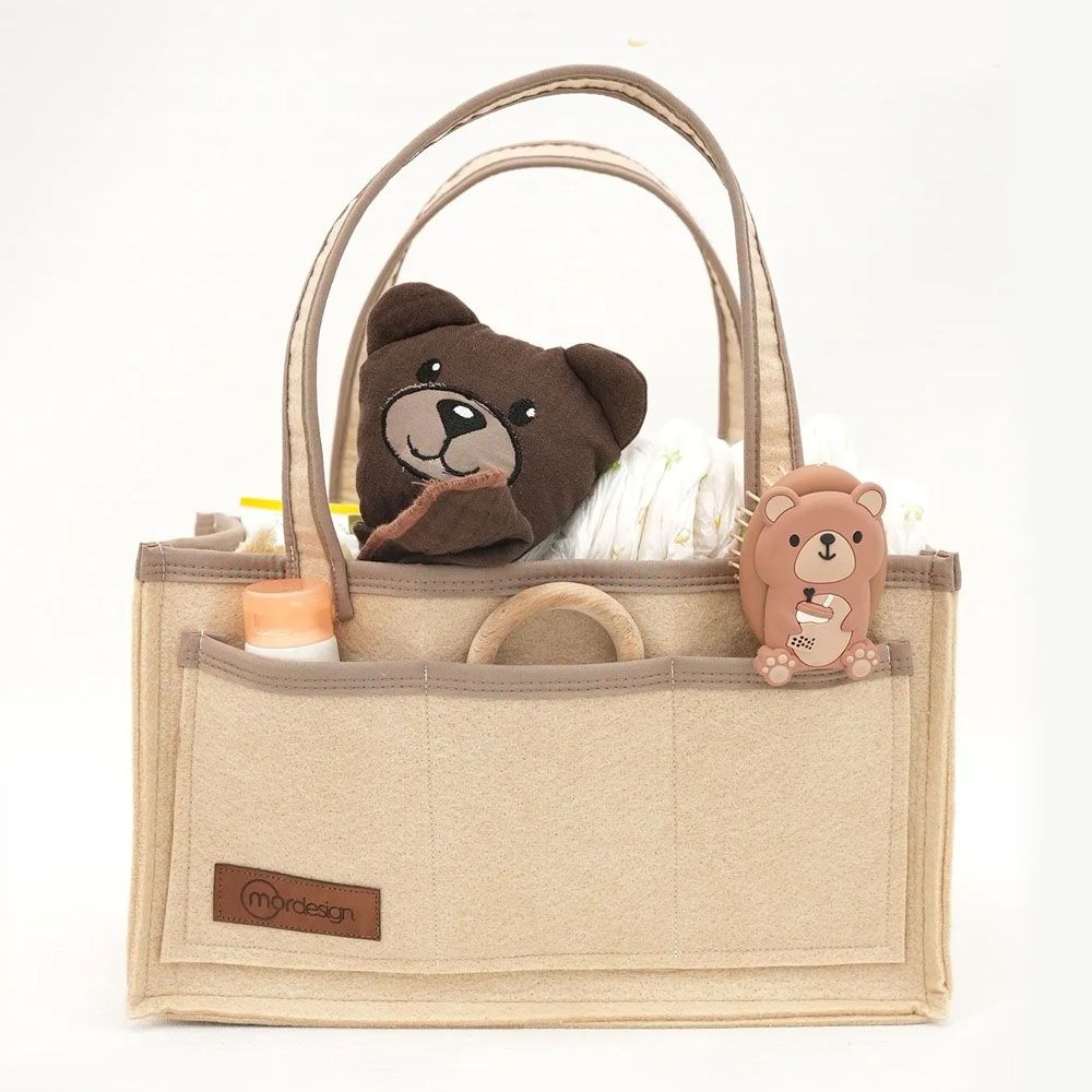 https://www.vanastenbabysuperstore.nl/media/catalog/product/1/6/1662300001_2_organizer_mordesign_voor_commode_cappuccino.jpg