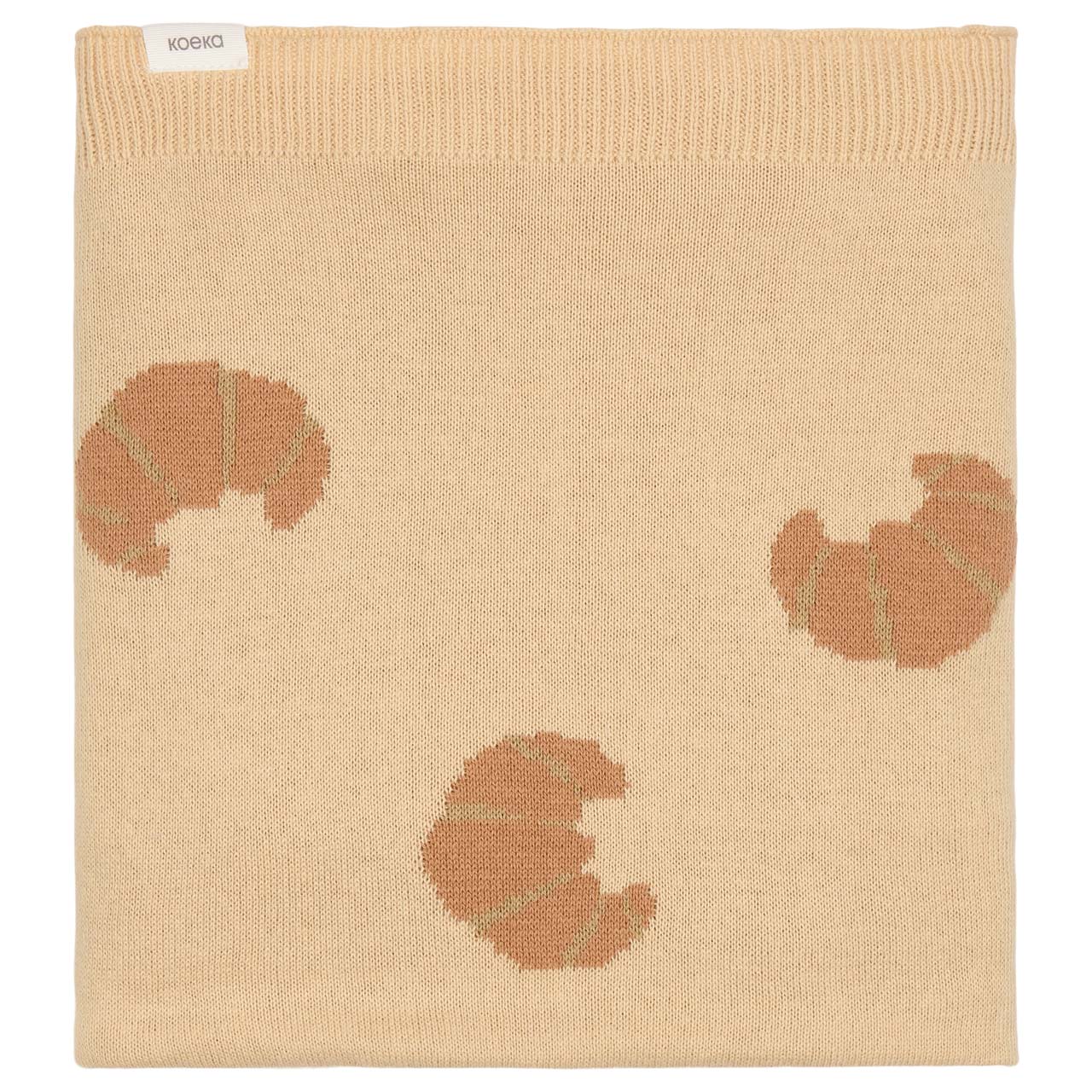 https://www.vanastenbabysuperstore.nl/media/catalog/product/1/8/1801900975_1_deken_ledikant_koeka_you_bake_me_happy_sand_2.jpg