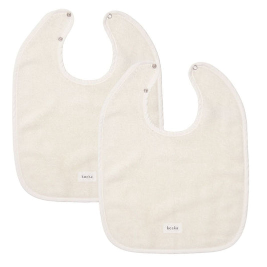https://www.vanastenbabysuperstore.nl/media/catalog/product/1/8/1802110196_1_slabber_koeka_dijon_daily_warm_white_2stk.jpg