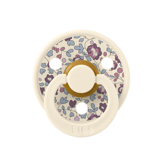 https://www.vanastenbabysuperstore.nl/media/catalog/product/1/9/1912800144_2_fopspeen_bibs_x_liberty_eloise_blush_mix_06mnd_2st.png