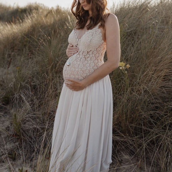 https://www.vanastenbabysuperstore.nl/media/catalog/product/2/5/2552650137_2_ketting_proud_mama_bola_nina_zilver.jpg