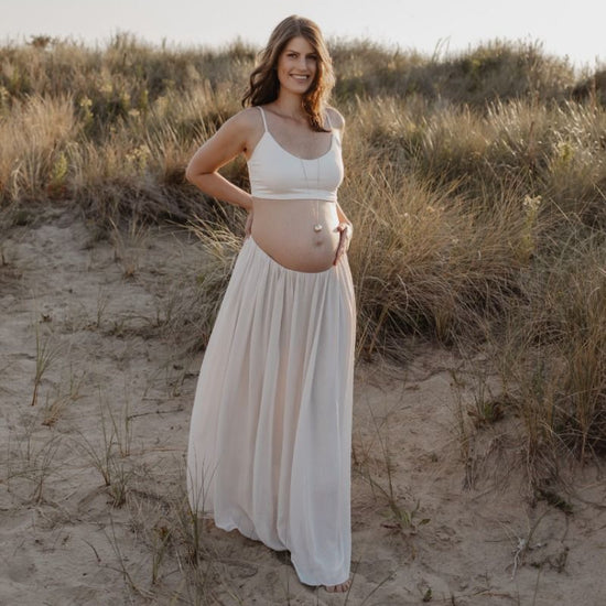 https://www.vanastenbabysuperstore.nl/media/catalog/product/2/5/2552650138_2_ketting_proud_mama_bola_nina_goud.jpg