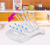 https://www.vanastenbabysuperstore.nl/media/catalog/product/2/9/2912800006_2_droogrek_munchkin_deluxe_drying_rack_white.png