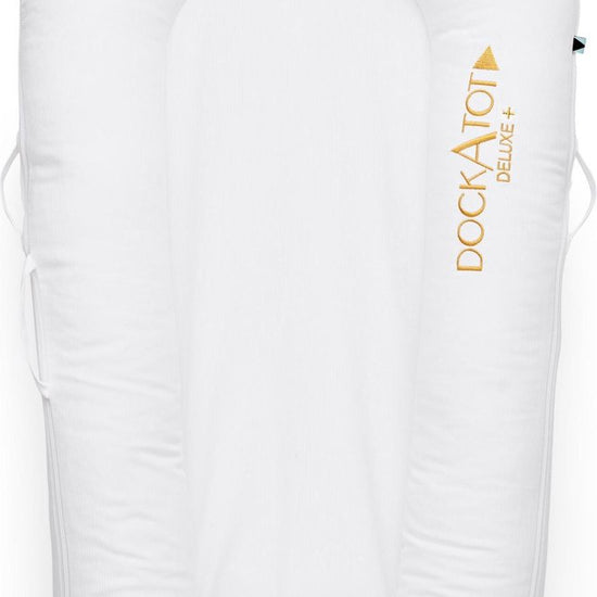 https://www.vanastenbabysuperstore.nl/media/catalog/product/3/7/3741790001_1_Babynest_Dockatot__Deluxe__Pristine_White.jpg