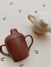 https://www.vanastenbabysuperstore.nl/media/catalog/product/4/2/4292830001_2_tuitbeker_konges_slojd_cherry_2pack_1775141031.jpg