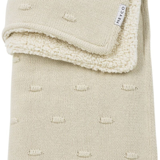 https://www.vanastenbabysuperstore.nl/media/catalog/product/4/5/4591901184_1_deken_ledikant_meyco_knots_teddy_soft_sand_100x150.jpg