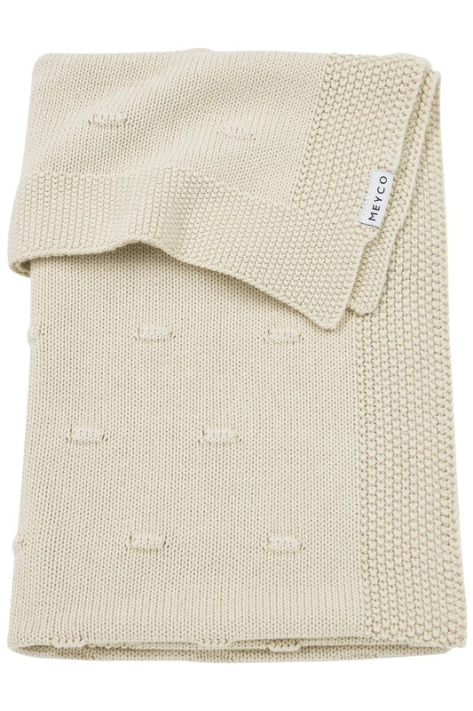 https://www.vanastenbabysuperstore.nl/media/catalog/product/4/5/4591901186_1_deken_ledikant_meyco_knots_soft_sand_100x150.jpg