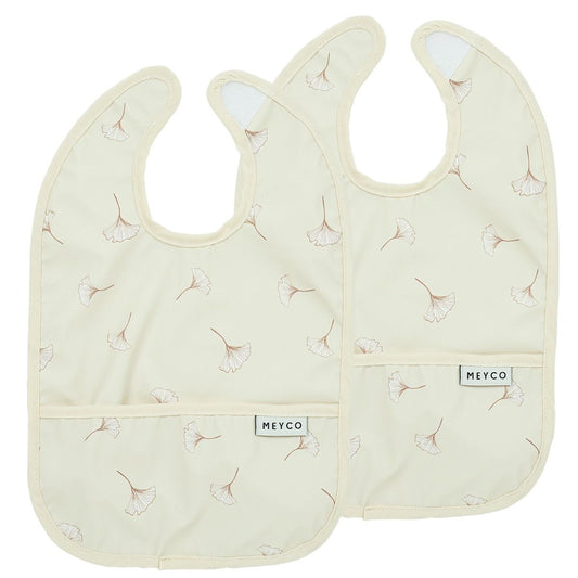 https://www.vanastenbabysuperstore.nl/media/catalog/product/4/5/4592870002_1_slabber_meyco_met_opvangbakje_gingko_soft_sand_2pack.jpg