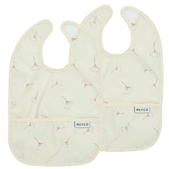 https://www.vanastenbabysuperstore.nl/media/catalog/product/4/5/4592870002_1_slabber_meyco_met_opvangbakje_gingko_soft_sand_2pack.jpg