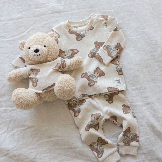 https://www.vanastenbabysuperstore.nl/media/catalog/product/5/0/50500088_2_feetje_pyjama_teddy_bear_offwhite_melange_1.jpg