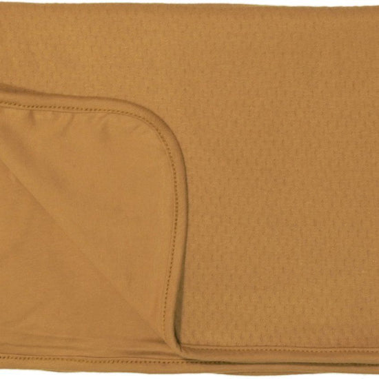 https://www.vanastenbabysuperstore.nl/media/catalog/product/5/4/5421900117_1_deken_wieg_snoozebaby_zomer_gots_75x100_toffee.jpg
