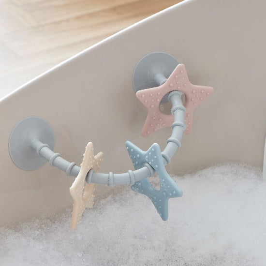 https://www.vanastenbabysuperstore.nl/media/catalog/product/6/5/6532440001_2_Badspeeltje_Stick_N_pLAY_sTAR_tOY_1778160627.jpg