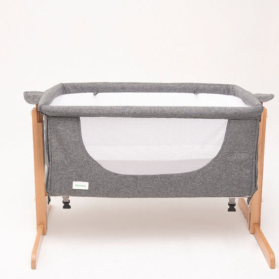 https://www.vanastenbabysuperstore.nl/media/catalog/product/7/0/7070060001_2_cosleeper_kukka_wood_xxl_bedside_crib_natural.jpg