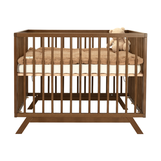 https://www.vanastenbabysuperstore.nl/media/catalog/product/7/1/7141500022_1_box_colorfull_home_donna_walnut.png