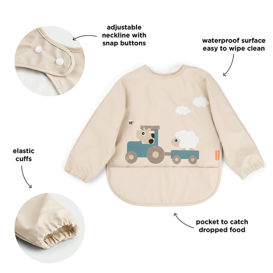 https://www.vanastenbabysuperstore.nl/media/catalog/product/7/3/7332870010_2_slabber_done_by_deer_mouw_tiny_farm_sand_1770299424.jpg