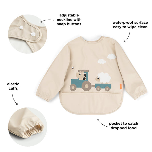 https://www.vanastenbabysuperstore.nl/media/catalog/product/7/3/7332870010_2_slabber_done_by_deer_mouw_tiny_farm_sand_1770299424.jpg