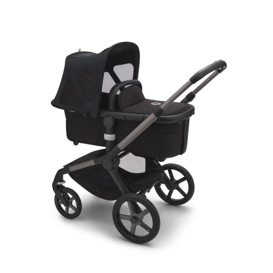 https://www.vanastenbabysuperstore.nl/media/catalog/product/7/5/7571120185_2_zonnekap_bugaboo_breezy_fox5fox_cub_v2_midnight_black.jpg