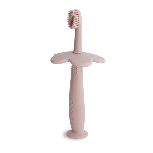https://www.vanastenbabysuperstore.nl/media/catalog/product/8/2/8292110032_1_training_tandenborstel_mushie_flower_blush.jpg