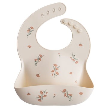 https://www.vanastenbabysuperstore.nl/media/catalog/product/8/2/8292110038_1_slabber_mushie_siliconen_pink_flowers.jpg