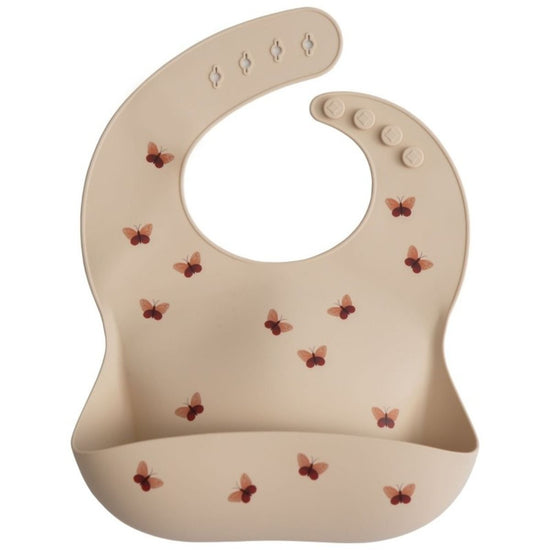 https://www.vanastenbabysuperstore.nl/media/catalog/product/8/2/8292110046_1_slabber_mushie_siliconen_butterflies.jpg