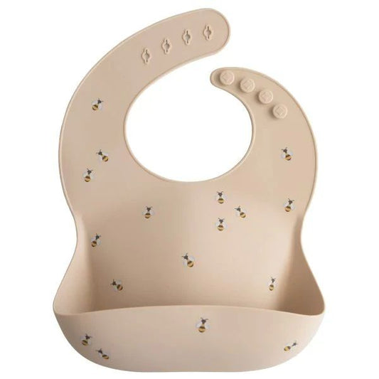 https://www.vanastenbabysuperstore.nl/media/catalog/product/8/2/8292110061_1_slabber_mushie_siliconen_bee.jpg