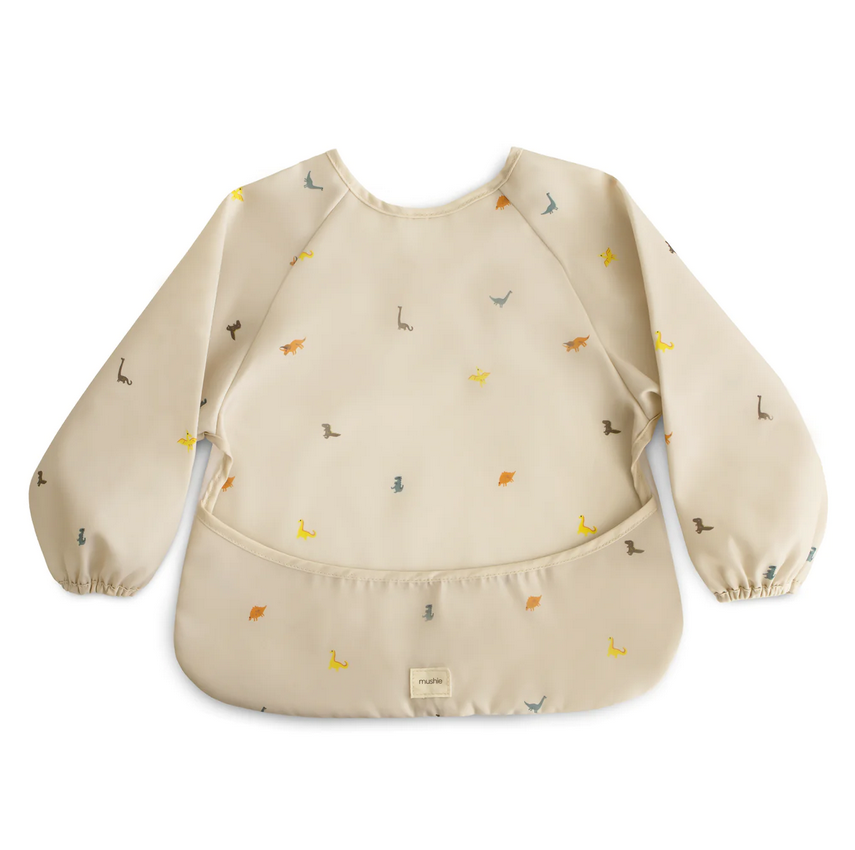 https://www.vanastenbabysuperstore.nl/media/catalog/product/8/2/8292110066_1_slabber_mushie_long_sleeve_dinos.png