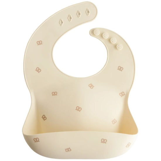 https://www.vanastenbabysuperstore.nl/media/catalog/product/8/2/8292110069_1_slabber_mushie_siliconen_pretzel.jpg