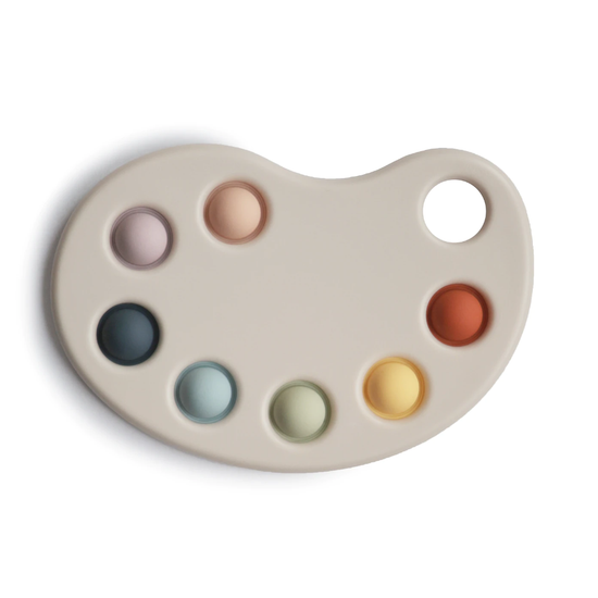 https://www.vanastenbabysuperstore.nl/media/catalog/product/8/2/82924000008_1_pop_it_mushie_paint_palette_multi.png