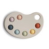 https://www.vanastenbabysuperstore.nl/media/catalog/product/8/2/82924000008_1_pop_it_mushie_paint_palette_multi.png